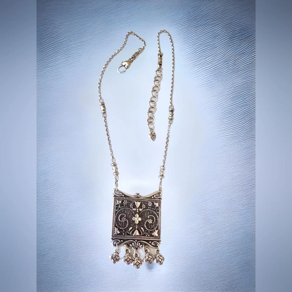 Brighton pendant necklace. Square pendant with loose charms. 10